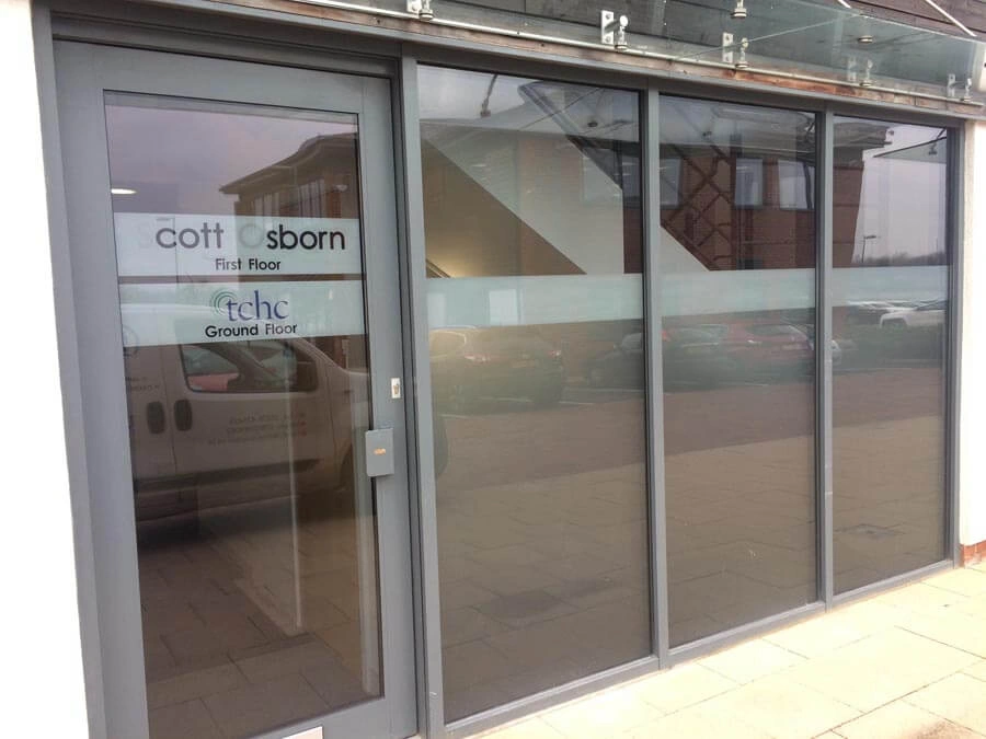 Building Bullet Proof Film Protection by AW Sign Services.