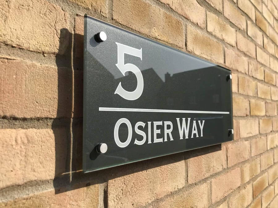 House number signage mounted outside a property.