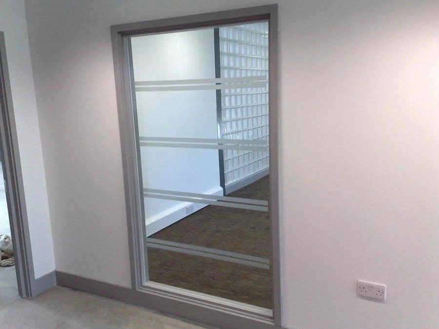 Office Door Film by AW Sign Services.
