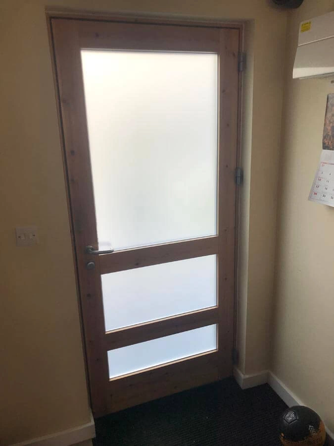 Privacy Door Film by AW Sign Services.