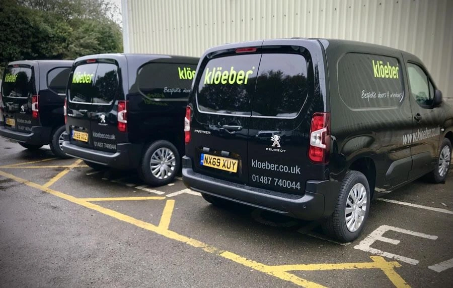 Vehicle Van Fleet Signage Wraps by AW Sign Services.